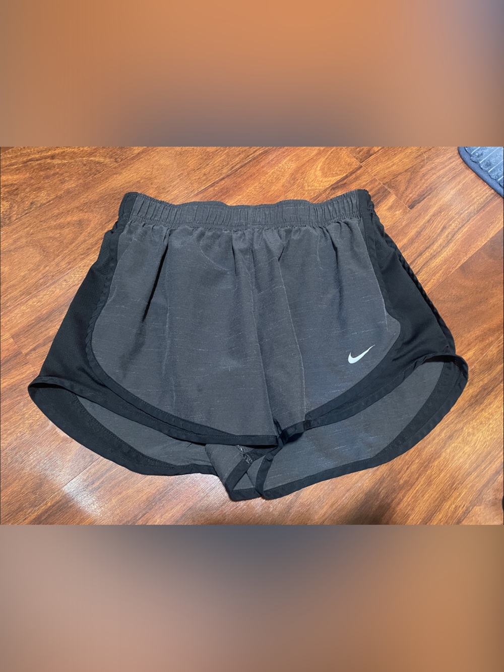 Nike Gray Running Shorts with black piping and White Swoosh
